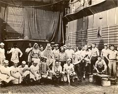 Officers and men of the USS Catamount particiapte in a Crossing the Line ceremony marking the crossing of the Equator.  Spring, 1945 in the Pacific