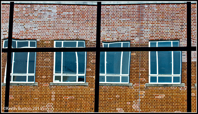 Distorted reflections of windows in a window!