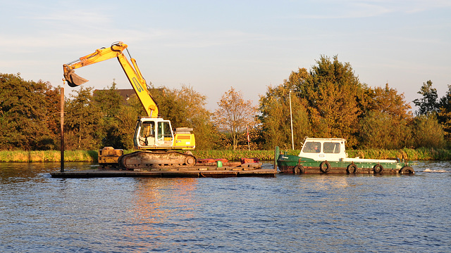 Digger on a boat