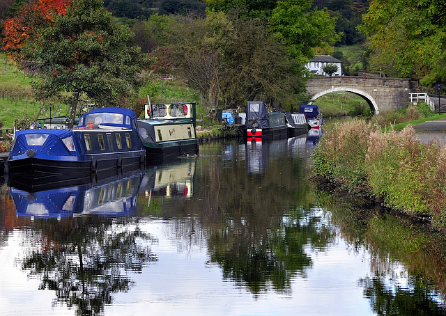 Canal, boats and reflections.