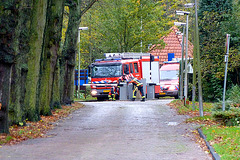 Fire Department trying to get passed a barrier