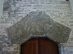 st.george tympanum over south door, showing george as a crusading norman knight earliest c12st.george's church, fordington, dorchester, dorse