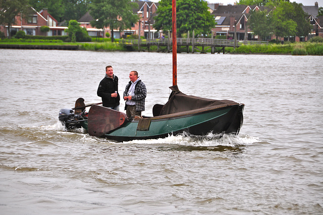 Small sailing vessel passing Dordrecht