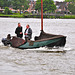 Small sailing vessel passing Dordrecht