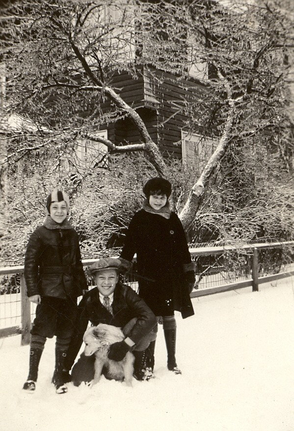 My Dad kneeling with his siblings and the family dog, c. 1929.