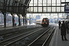 Railion 6498, 6499 and 6496 pulling a goods train through Amsterdam Central station