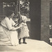 My dad with his mother, patriotically showing the colors from the front porch shortly after the U.S. entered the Great War, 1917