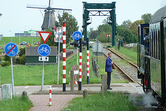 Travelling with the steam tram from Hoorn to Medemblik – Stopping traffic with a red flag