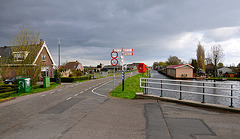 View of the bridge and Veenderdijk near Hoogmade and Rijpwetering