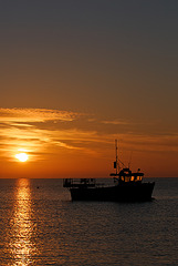 Selsey - Fishing boat at sunrise