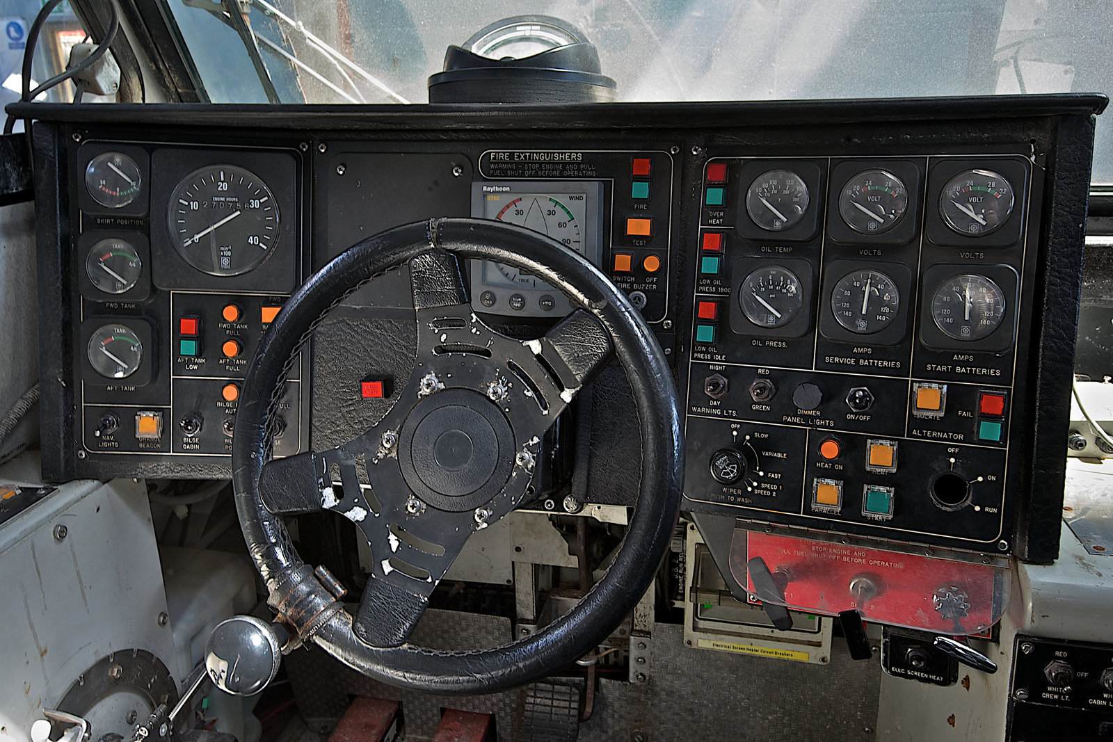 Cockpit control panel and steering wheel