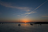 Sunset and vapour trails