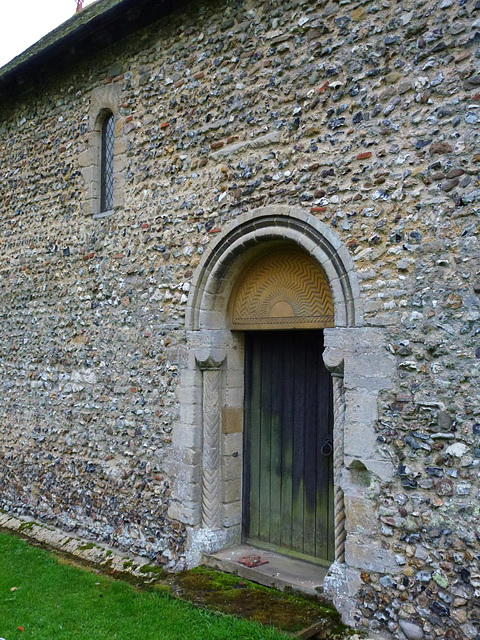 great canfield church, essex,the north side of the nave is  all c12, only the tympanum is modern