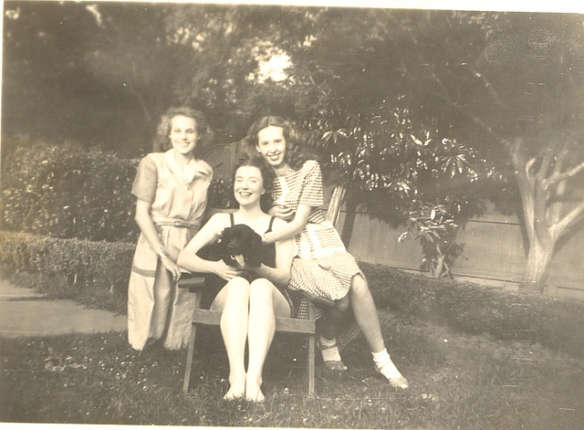 Alice, with dog and two friends, about 1940