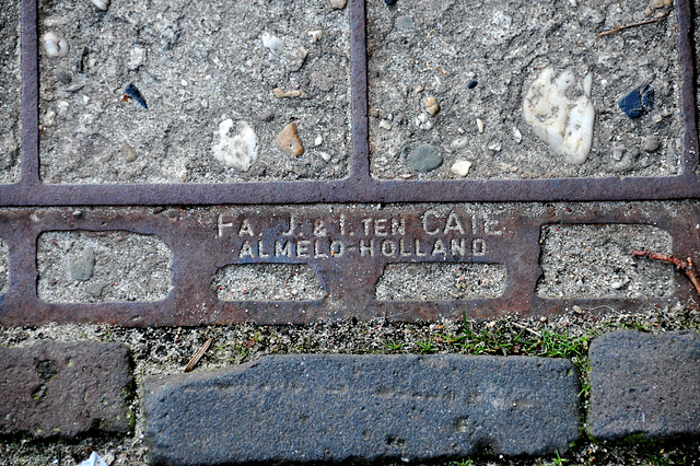 Detail of a manhole cover of the firm J. & I. ten Cate of Almelo, Holland