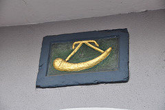 Gable stone of a horn in Maastricht
