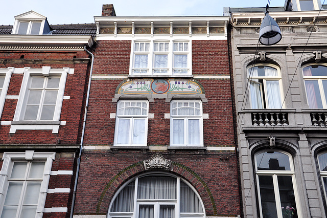 Gable ornament of a cow and tulips