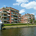 Apartment building on the bank of the canal from Delft to The Hague