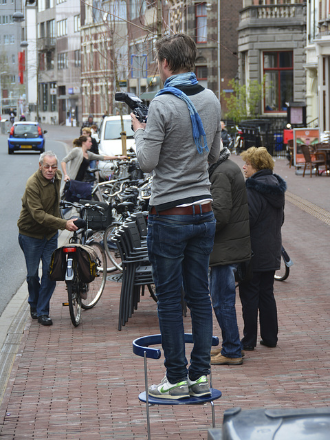 Photographer on a chair