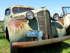 Rusty Old Car But The Headlamps Look OK