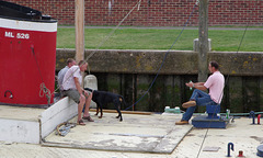 Three Men On A Boat, And A Dog