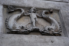 Cherub with dolphins