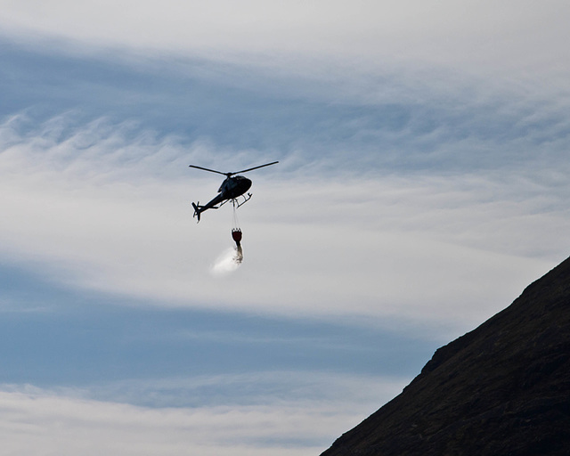 Torridon fire 6: Helicopter with water bucket attached