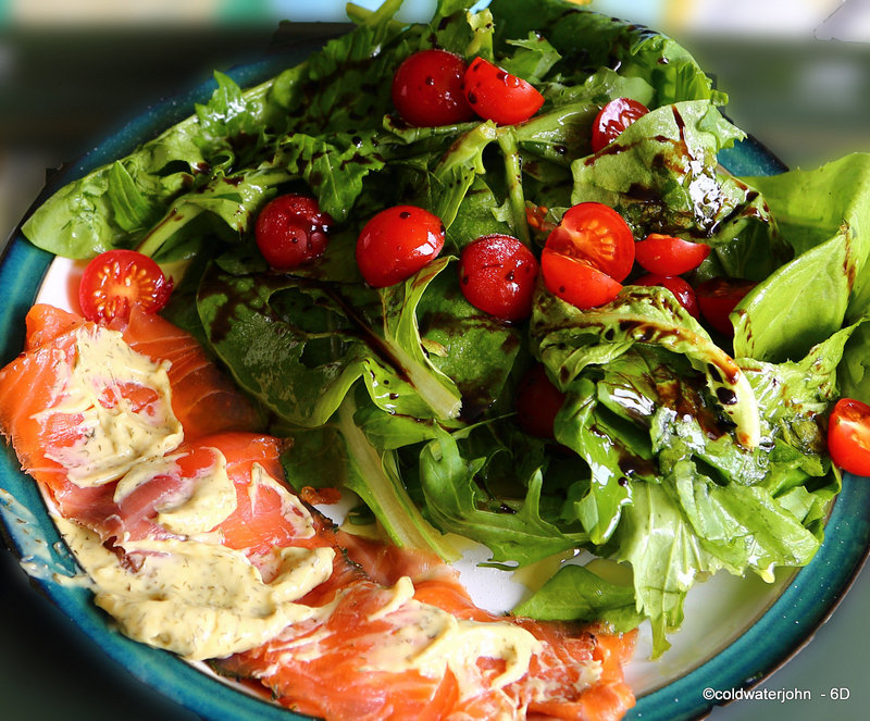 Home-cured Gravadlax with fresh dill from the garden, garden salad leaves, and a dill and mustard sauce...