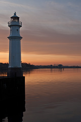 Newhaven lighthouse at sunset