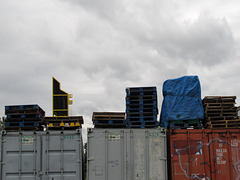 Pallets and a grey sky