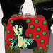Peggy Bacon makeup case, red side