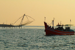 Fishing Boat Returns at the End of the Day