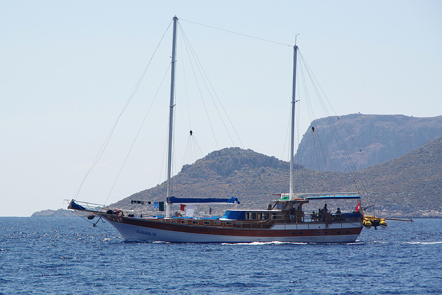 a passing boat, with washing line