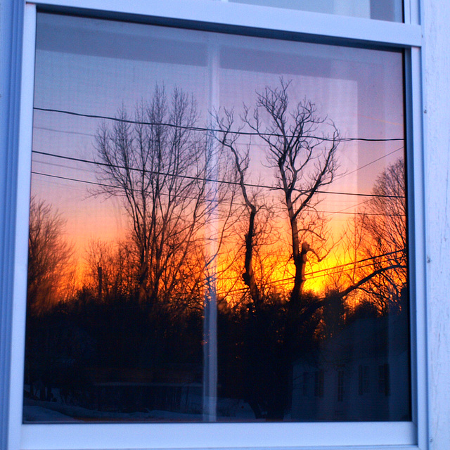 sunrise reflected in my window