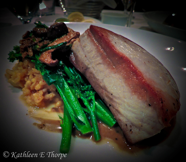 Ahi Tuna with broccoli rapini.  I'm enjoying food photography so much that the first thought I have when the food is served, is the angle of the shot!!  {:o)