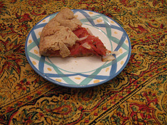 Slice of rustic tomato tart