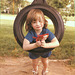 Emily, in the swing with Skittles. 1984