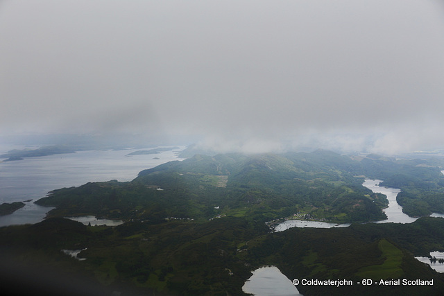 Aerial - West Coast Scotland Severe weather front ahead north of Loch Sween!