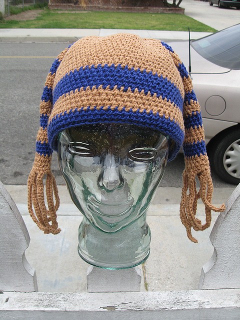 Crocheted hat with stripes and tentacles