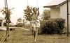 Mom, springtime swingtime.  c. 1962