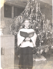 Karen, Christmas, 1957. Practicing for children's choir. Karen, Christmas, 1957. Practicing for children's choir.