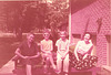 Backyard portraits. Grands, Karen, Rick and Mom, 1957