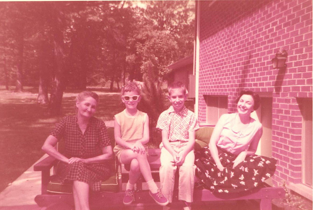 Backyard portraits. Grands, Karen, Rick and Mom, 1957