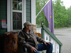 Bruce contemplates the meaning of the Alaska state flag from the comfort of a gift shop's husband chair.