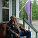 Bruce contemplates the meaning of the Alaska state flag from the comfort of a gift shop's husband chair.