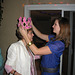 Emily adjusts the crown she made for mom