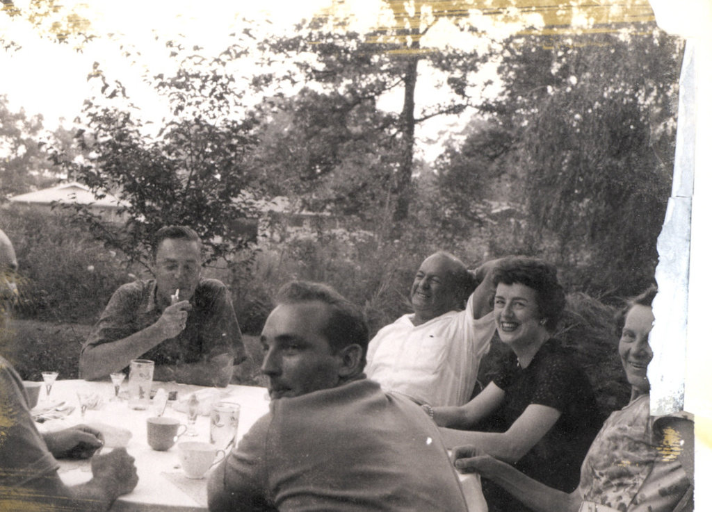 Dad lights up, John Kaestner, Uncle Nick, Aunt Lorraine and Aunt Esther, August, 1961