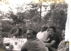 Dad lights up, John Kaestner, Uncle Nick, Aunt Lorraine and Aunt Esther, August, 1961