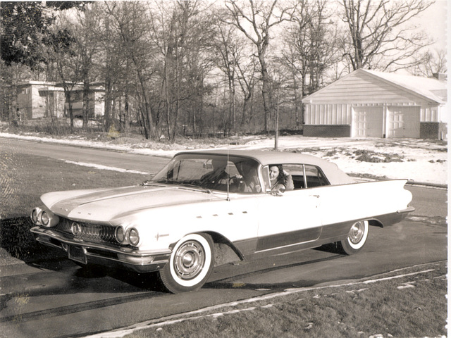 Mom's 1960 blue over white Buick Electra convertible.