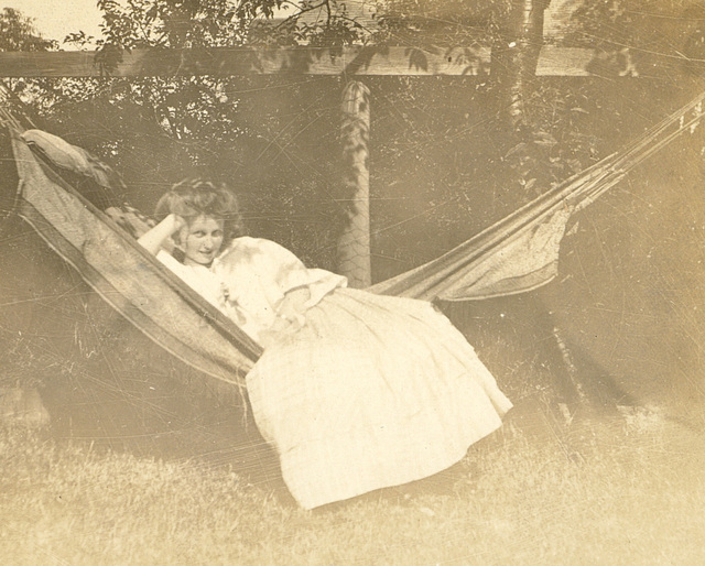 Summertime and the livin' is sultry.  My grandmother in the hammock, c. 1910